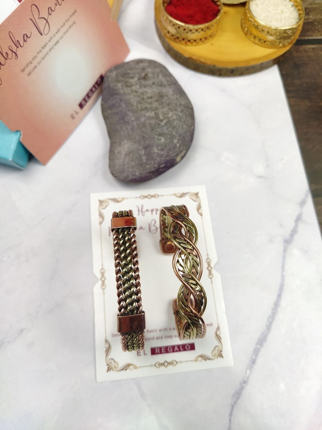 

EL REGALO Bhaiya Bhabhi Set Of 2 Copper Rakhi With Roli Chawal Card