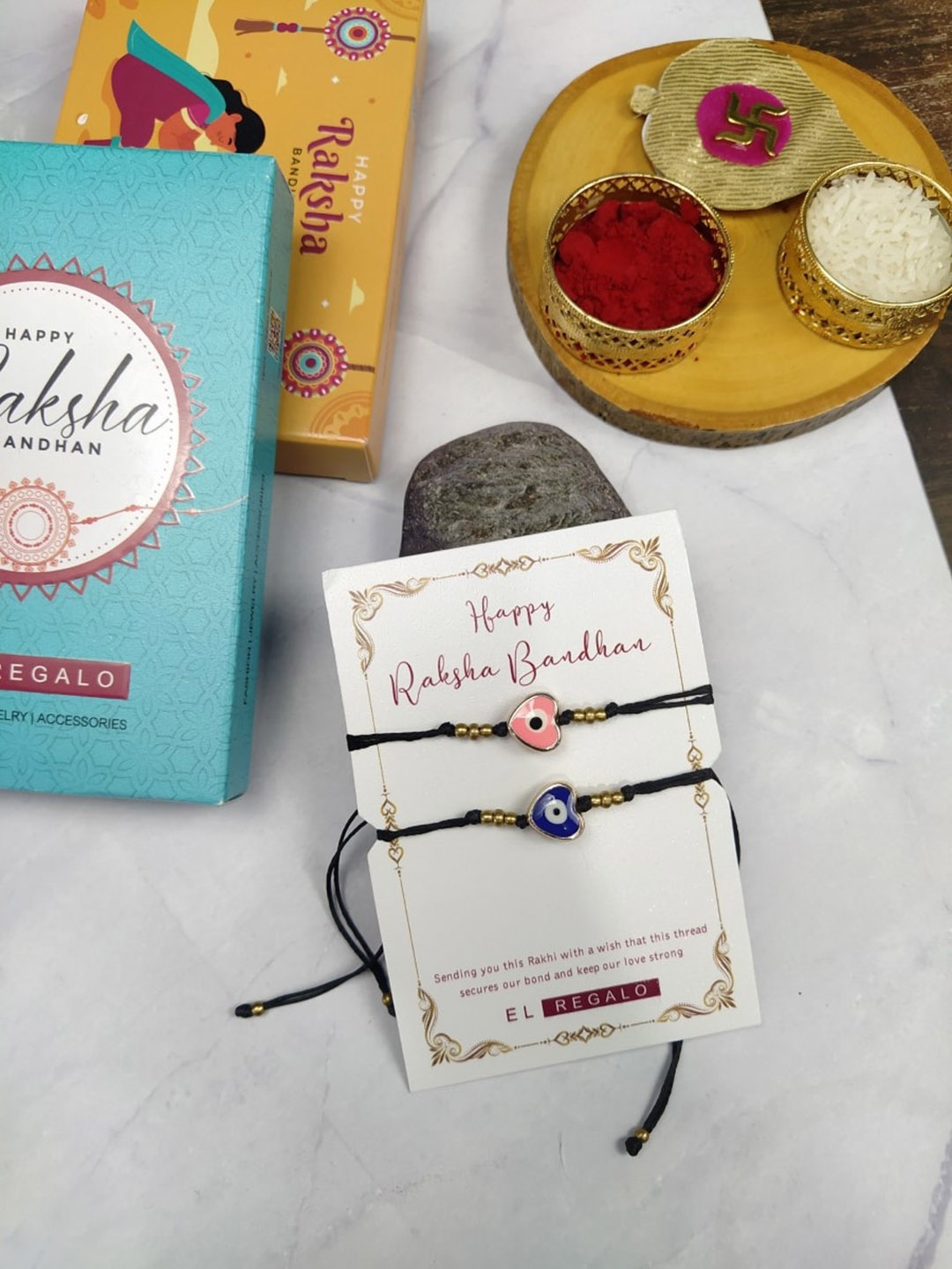 

EL REGALO Bhaiya Bhabhi Set Of 2 Evil Eye Rakhi Combo With and Card, Roli Chawal, Black