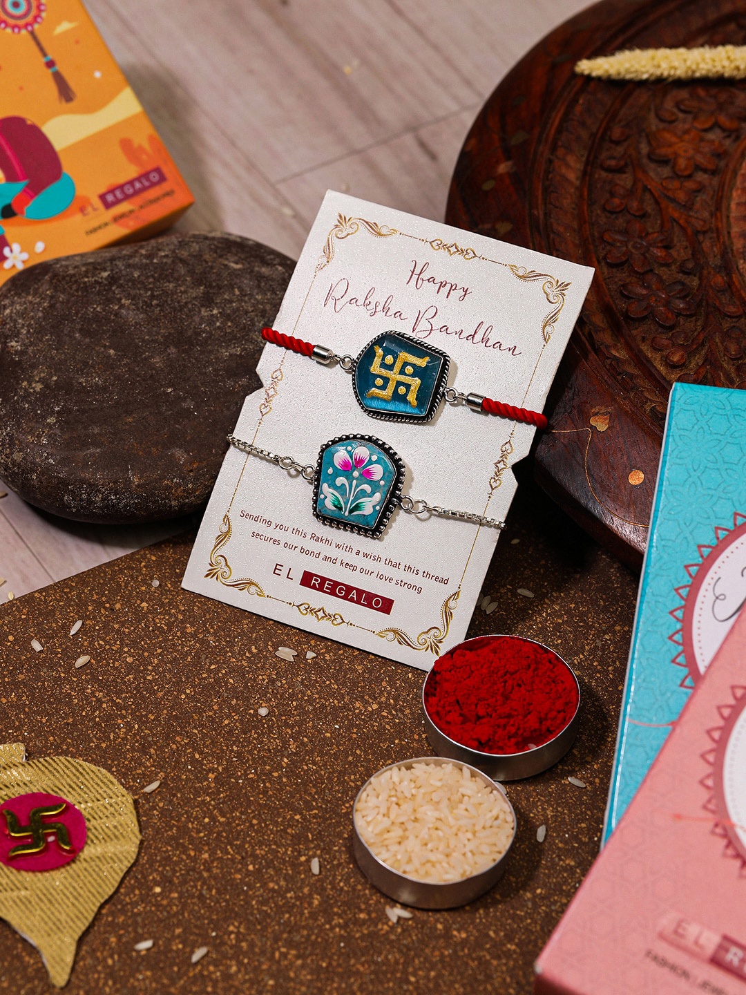 

EL REGALO Bhaiya Bhabhi 2 Pcs Charm Rakhi With Roli Chawal and Card, Blue