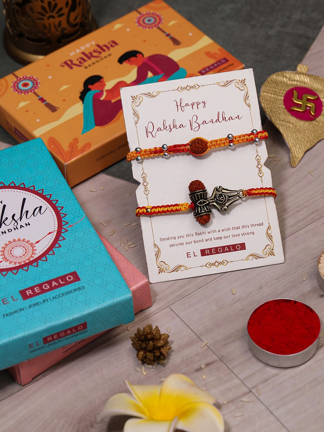 

EL REGALO Bhaiya Bhabhi 2 Pcs Charm Rakhi With Roli Chawal and Card, Red