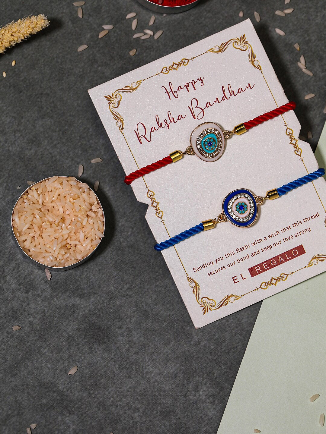

EL REGALO Bhaiya Bhabhi Set Of 2 Evil Eye Rakhi Combo With Roli Chawal, Blue