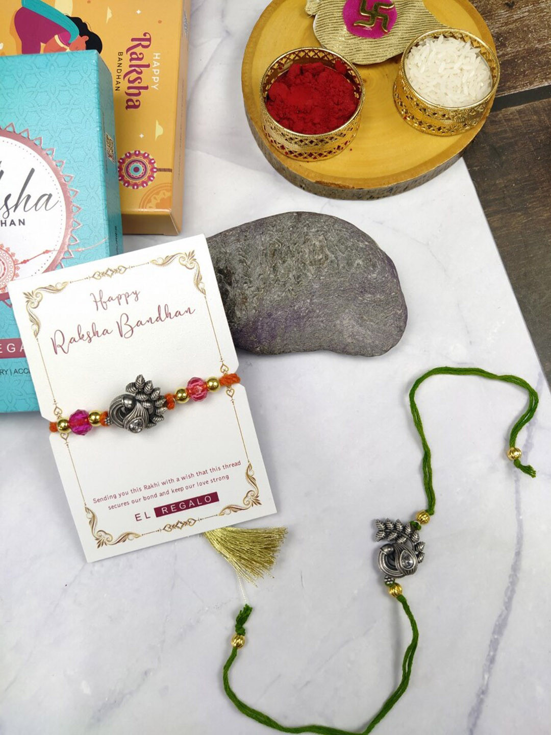 

EL REGALO Bhaiya Bhabhi 2 Pcs Charm Rakhi With Roli Chawal and Card, Silver