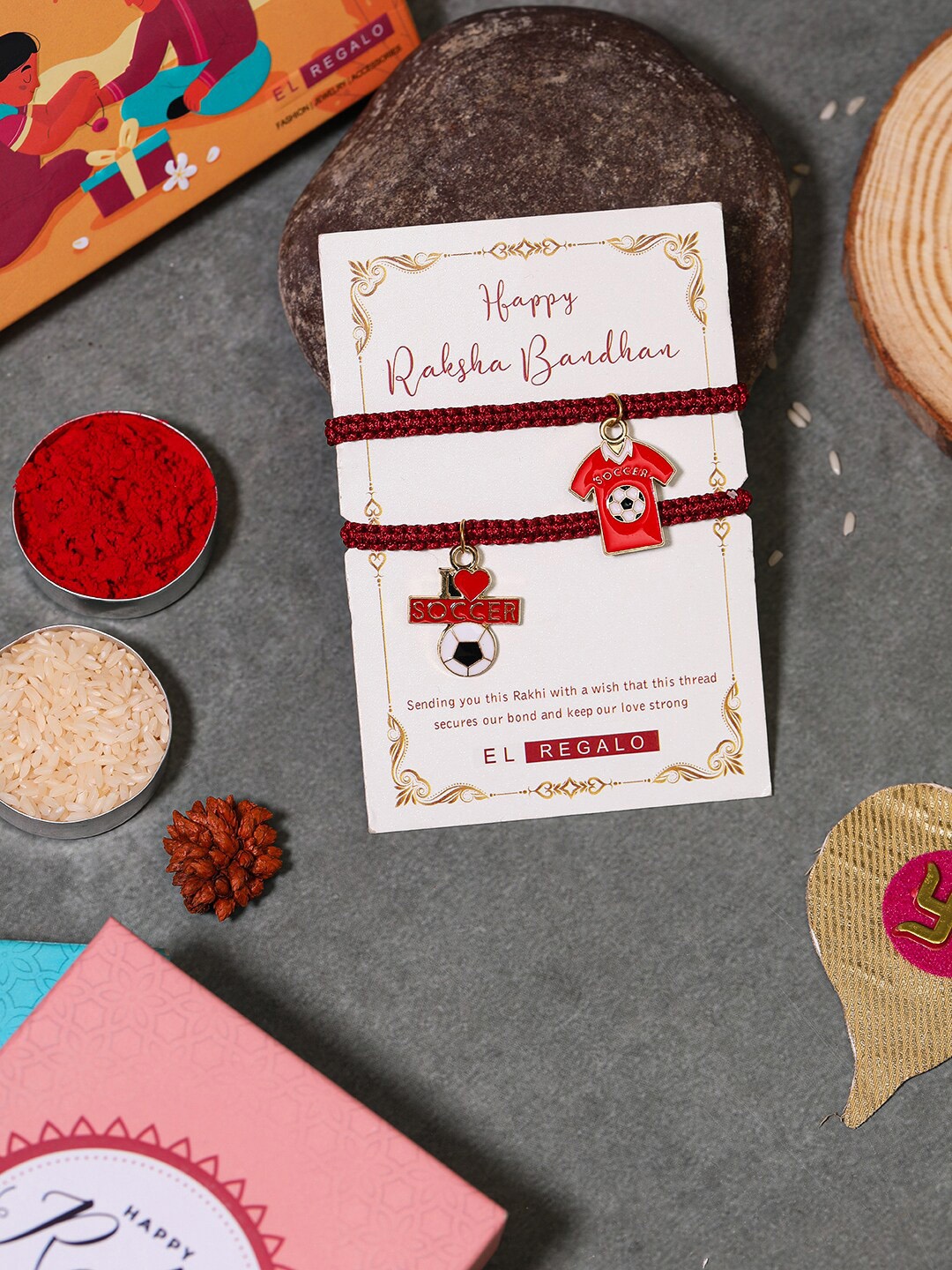 

EL REGALO Set Of 2 Charm Detail Rakhis With Roli & Chawal, Red