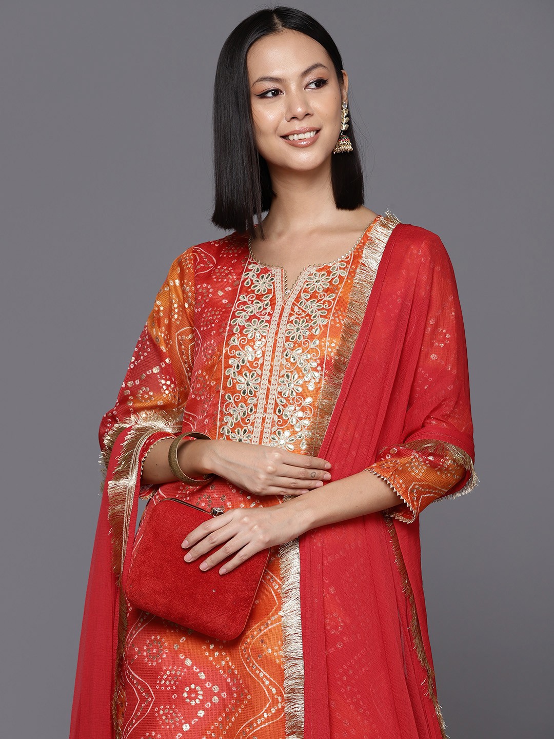 

Varanga Women Bandhani Printed Kurta With Trousers & Dupatta, Orange