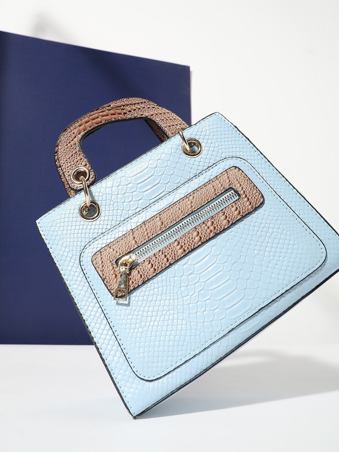 

HAUTE SAUCE by Campus Sutra Textured Structured Handheld Bag, Blue