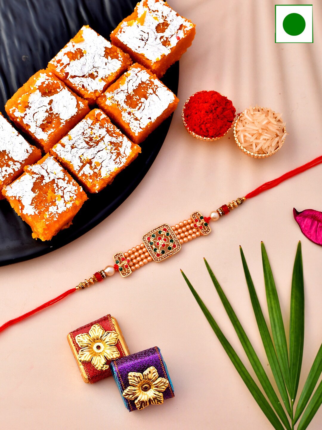 

Aapno Rajasthan Moong Dal Barfi Sweets Gift With Rakhi-200 g, Gold