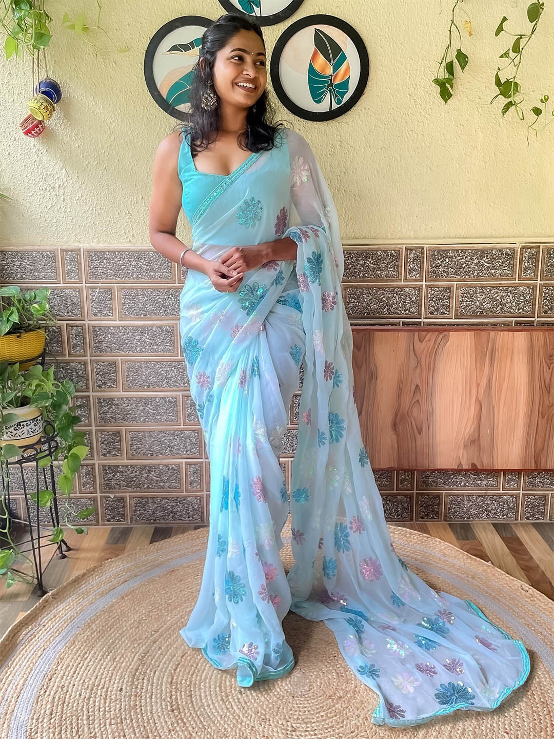 

Mitera Blue & Pink Embellished Sequinned Poly Georgette Saree