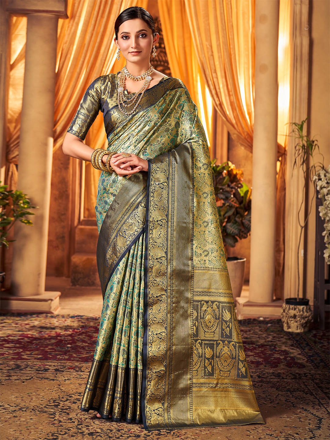 

Mitera Gold-Toned & Green Floral Woven Design Zari Kanjeevaram Saree