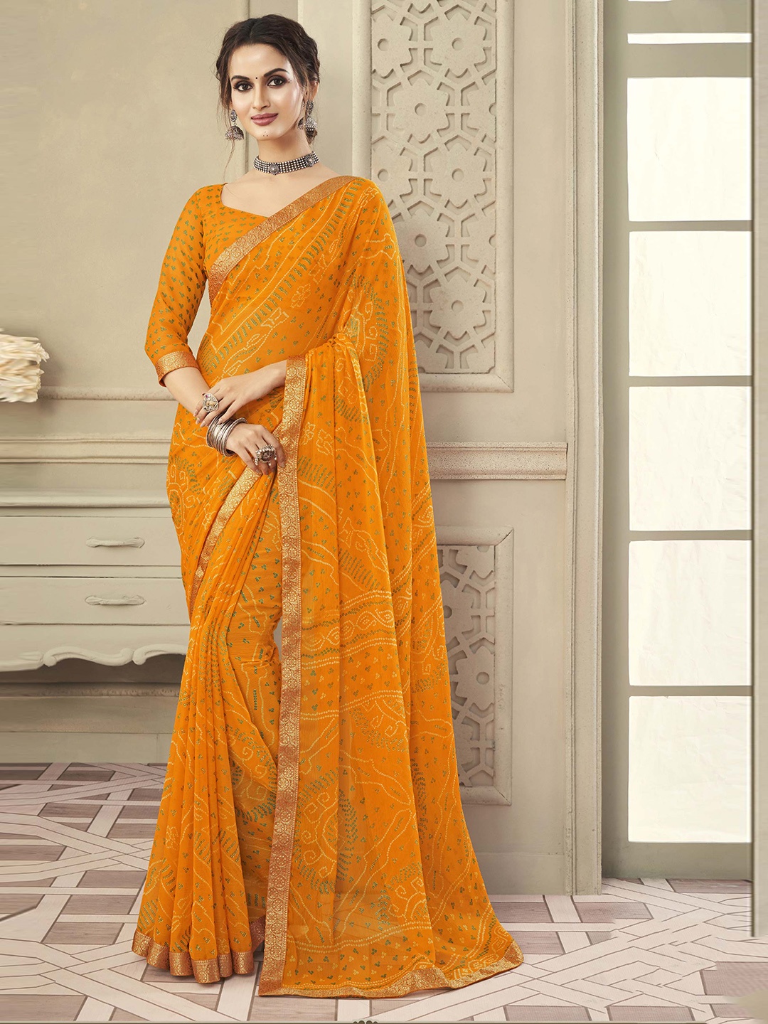 

Mitera Printed Zari Bandhani Saree, Yellow