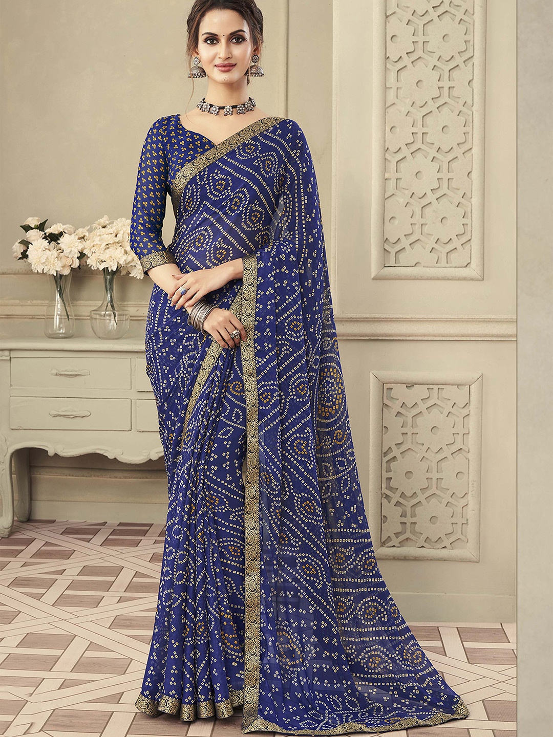 

Mitera Blue & Gold-Toned Bandhani Printed Zari Saree, Navy blue