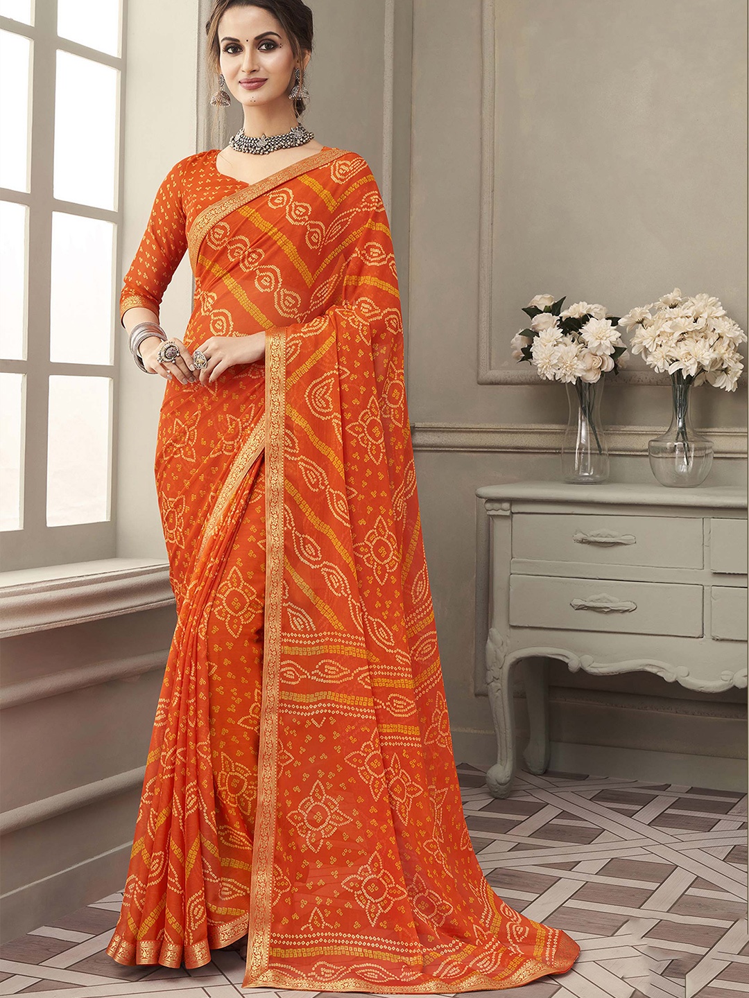 

Mitera Orange & Yellow Bandhani Printed Zari Saree