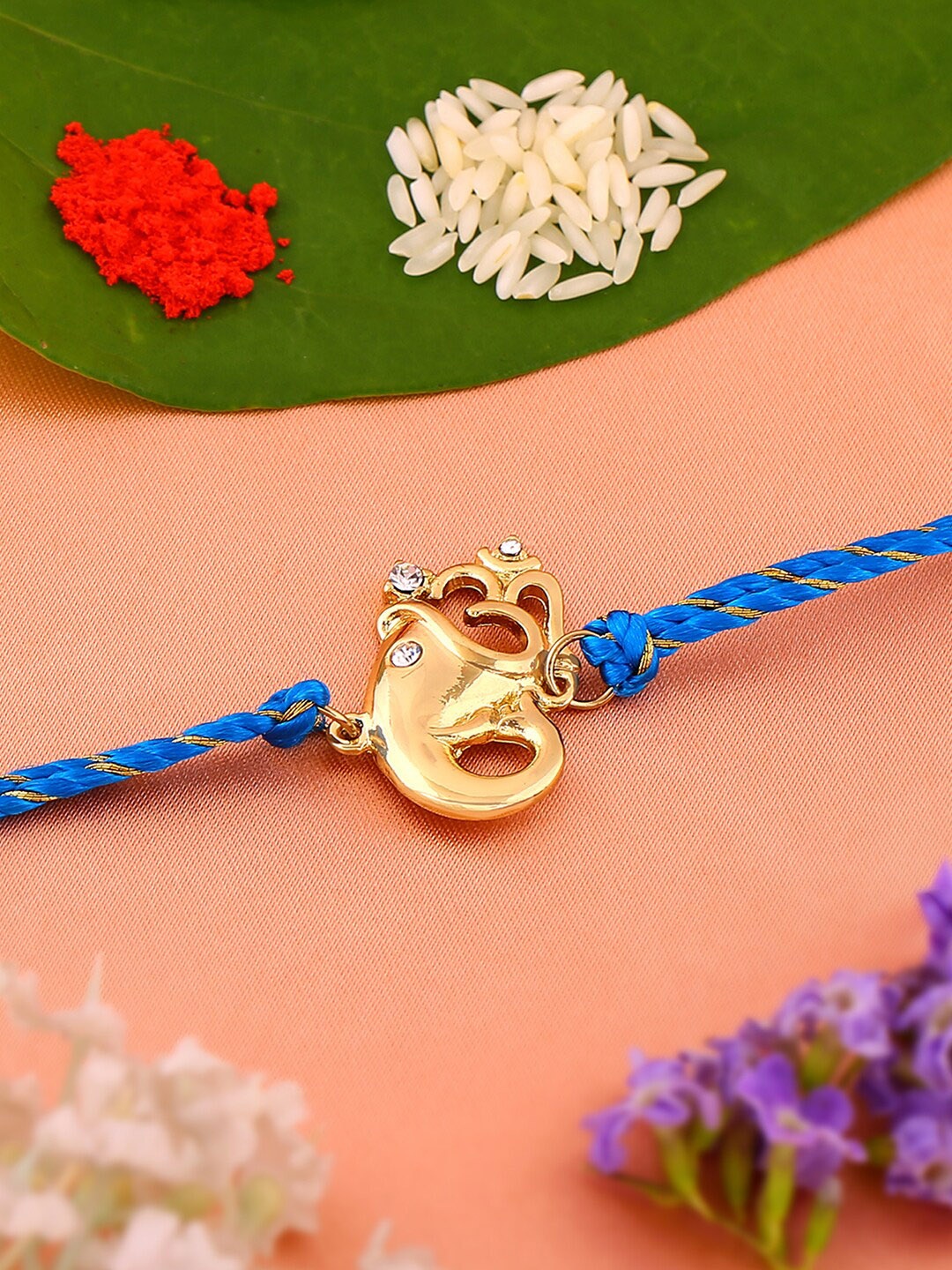 

Estele Gold-Plated Zircon-Studded & Beaded Ganesh & Om Charm Rakhi