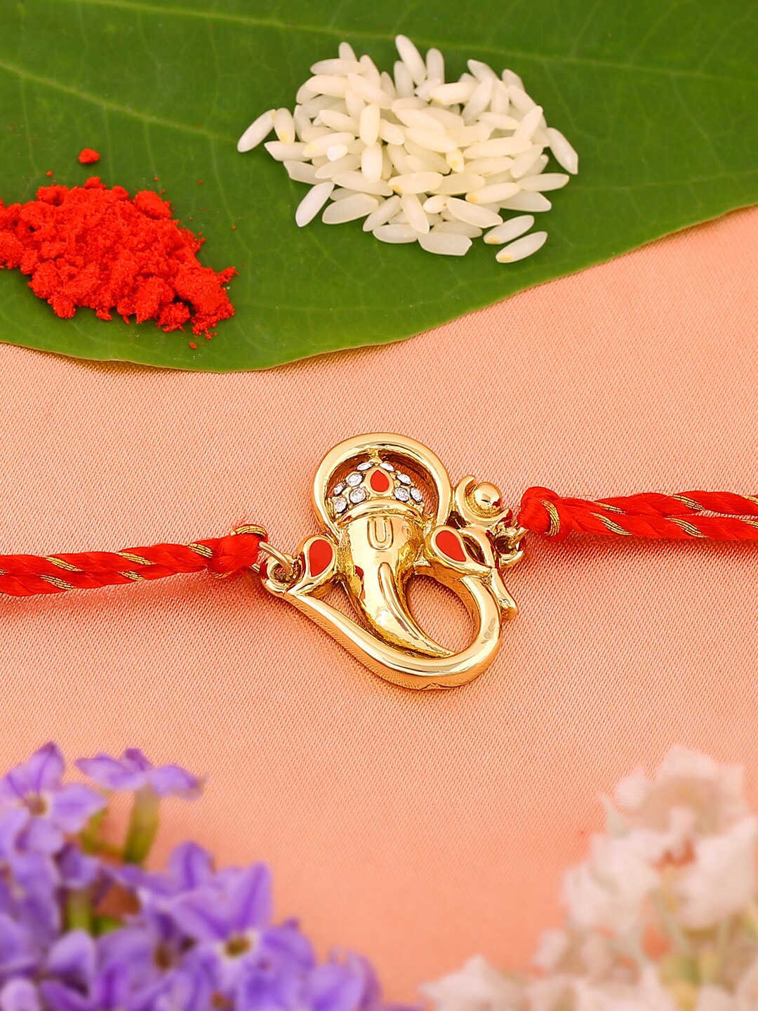 

Estele Gold-Plated Crystals-Studded Rakhi