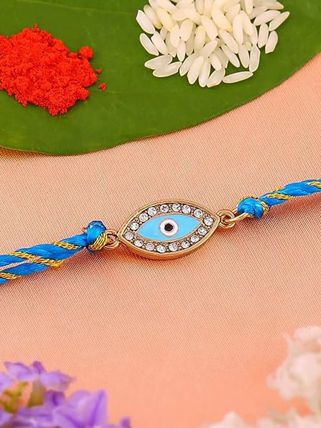 

Estele Gold-Plated Evil Eye Crystals-Studded Rakhi