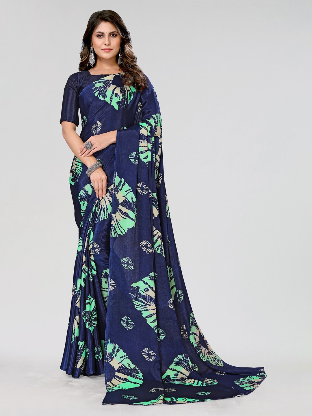 

Yashika Geometric Printed Poly Georgette Leheriya Saree, Teal