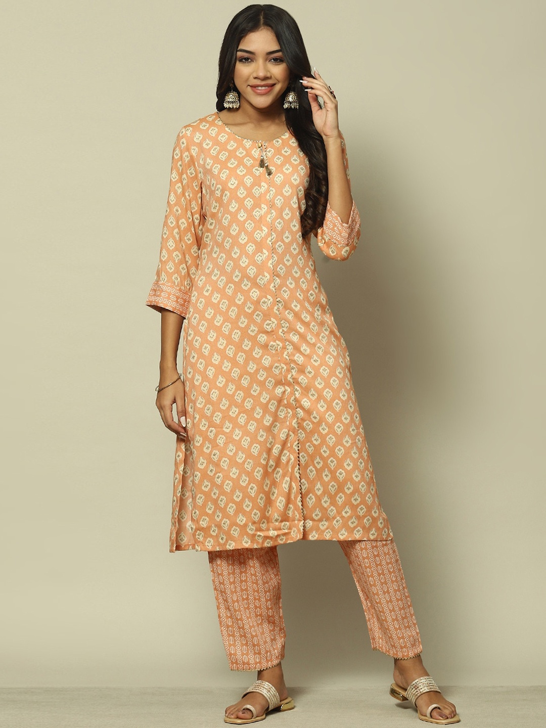 

Rangriti Ethnic Motifs Printed Regular Gotta Patti Kurta With Trousers, Peach