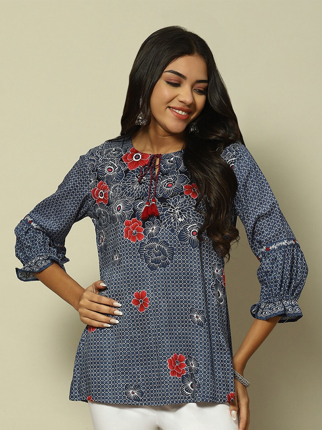 

Rangriti Floral Printed Tie Up Neck Puffed Sleeves Top, Blue