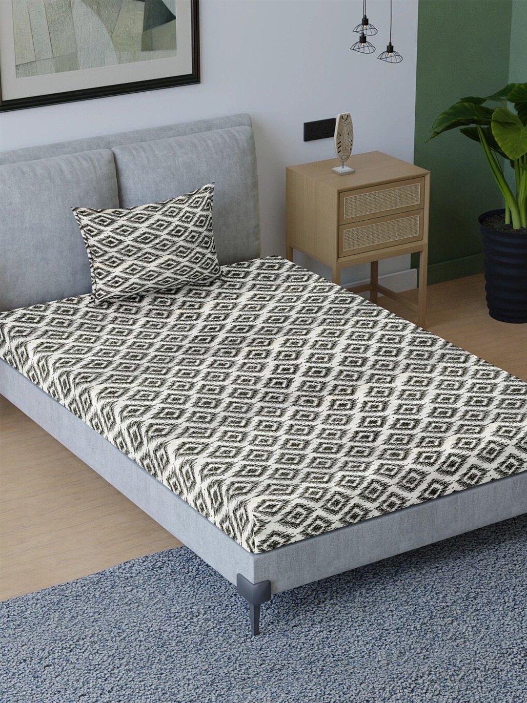 

Sangria Black & White Geometric-Printed 200TC Pure-Cotton Single Bedsheet & Pillow Cover