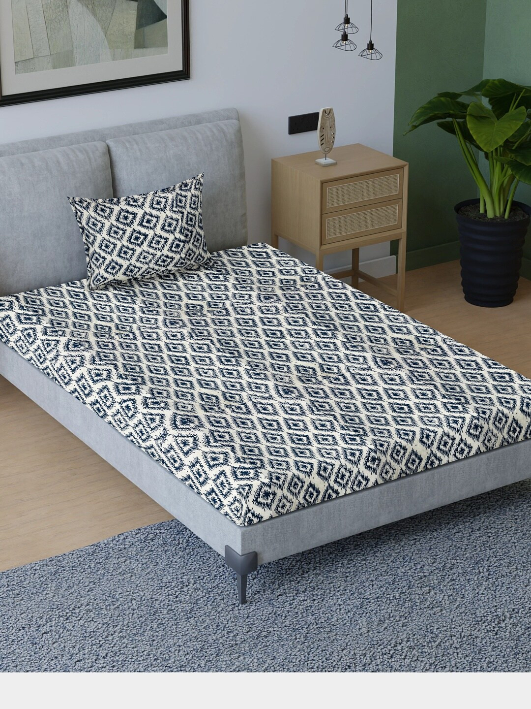 

Sangria White & Blue Printed Cotton 200 TC Single Bedsheet With 1 Pillow Cover