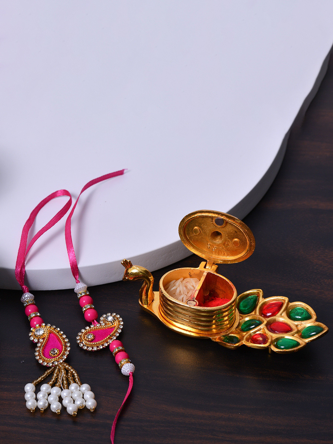 

Fashion Bizz Set Of 2 Rakhi With Roli-Chawal Holder, Pink