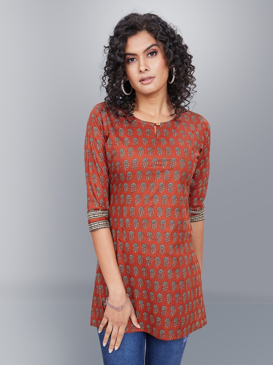 

Jevi Prints Ethnic Motifs Printed Keyhole Neck Pure Cotton Kurti, Rust