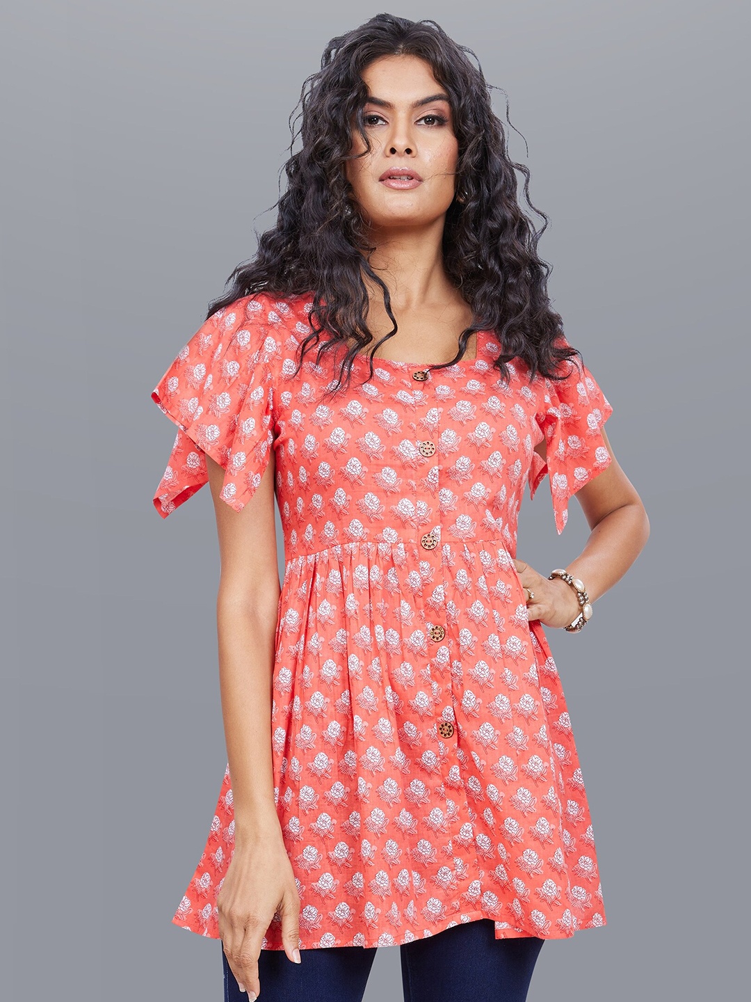 

Jevi Prints Floral Printed Flutter Sleeves Pure Cotton Kurti, Coral