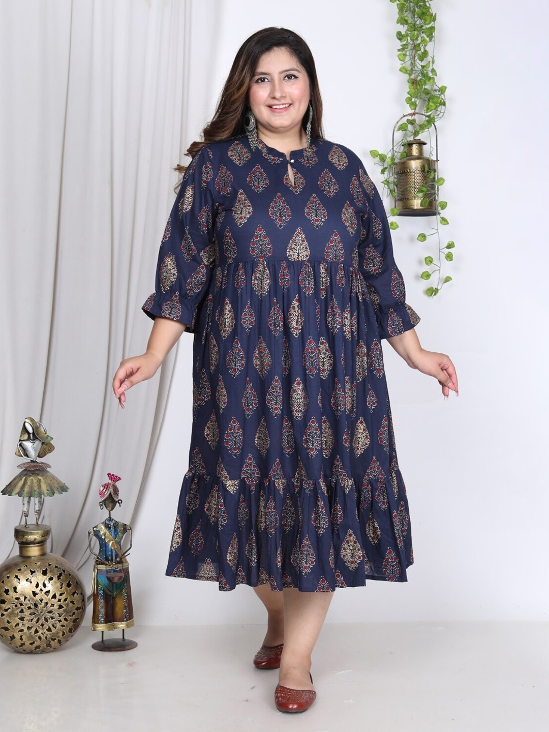 

Swasti Plus Size Floral Printed Tie-Up Neck Puff Sleeve Fit and Flare Midi Dress, Blue