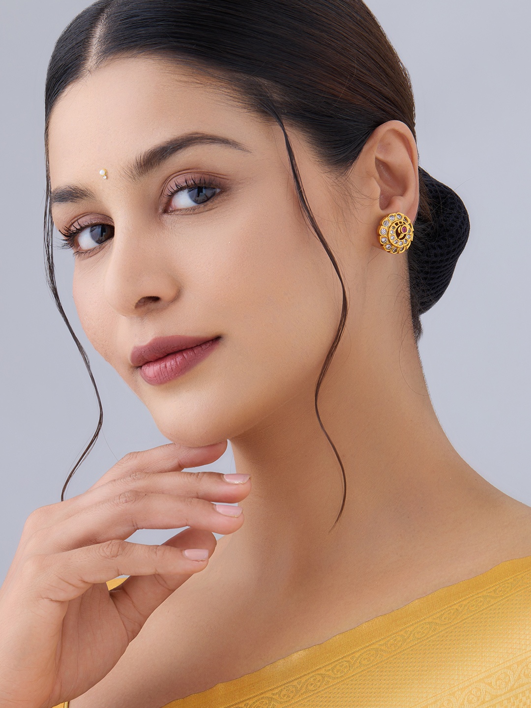 

Kushal's Fashion Jewellery Gold-Plated Circular Antique Studs Earrings