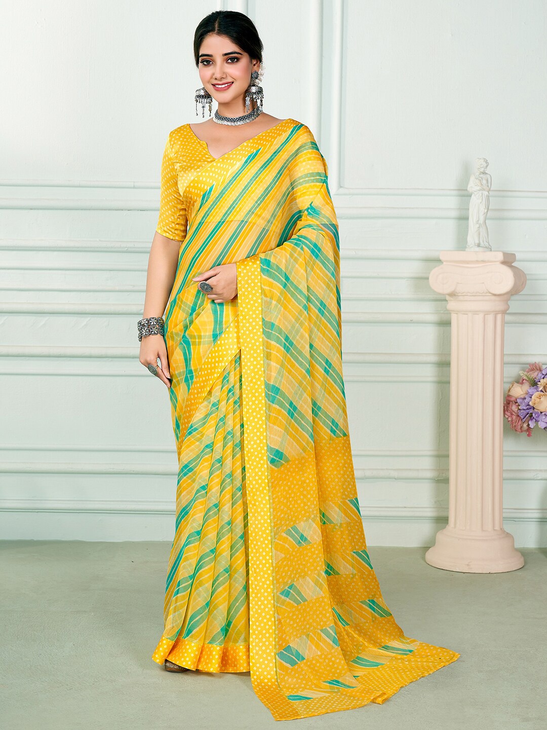 

Anouk Yellow & Blue Striped Pure Chiffon Saree