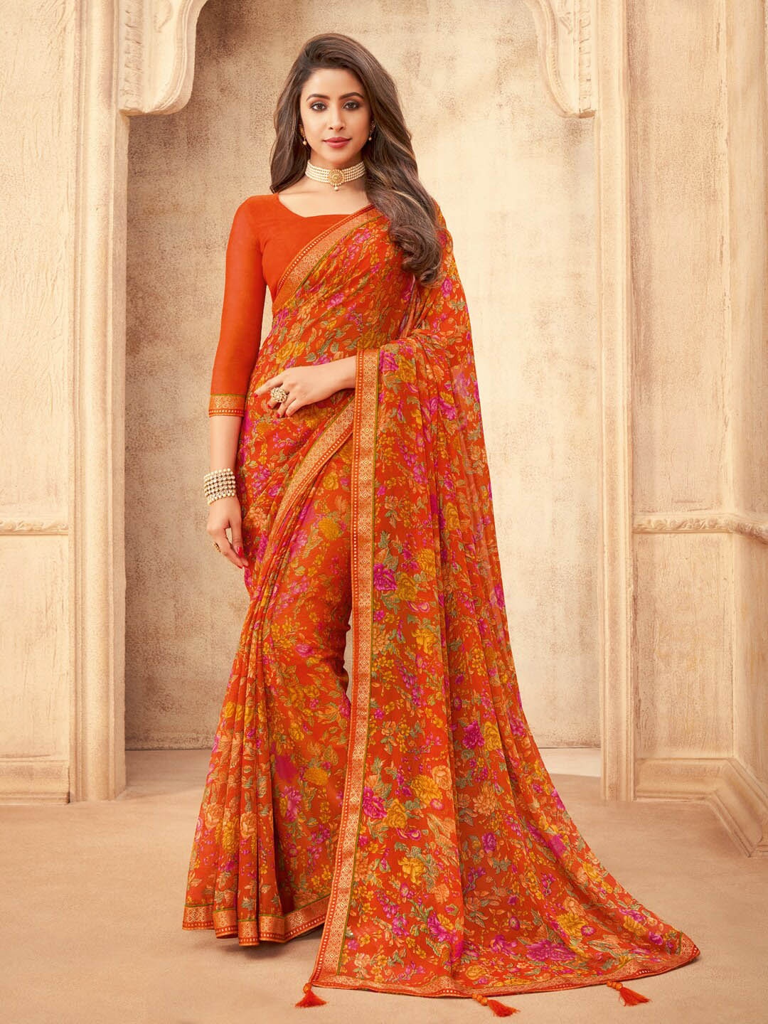 

Anouk Orange & Red Floral Printed Zari Pure Chiffon Saree