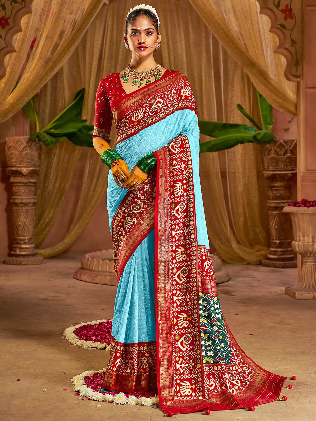 

Anouk Ethnic Motifs Printed Zari Silk Blend Patola Saree, Blue