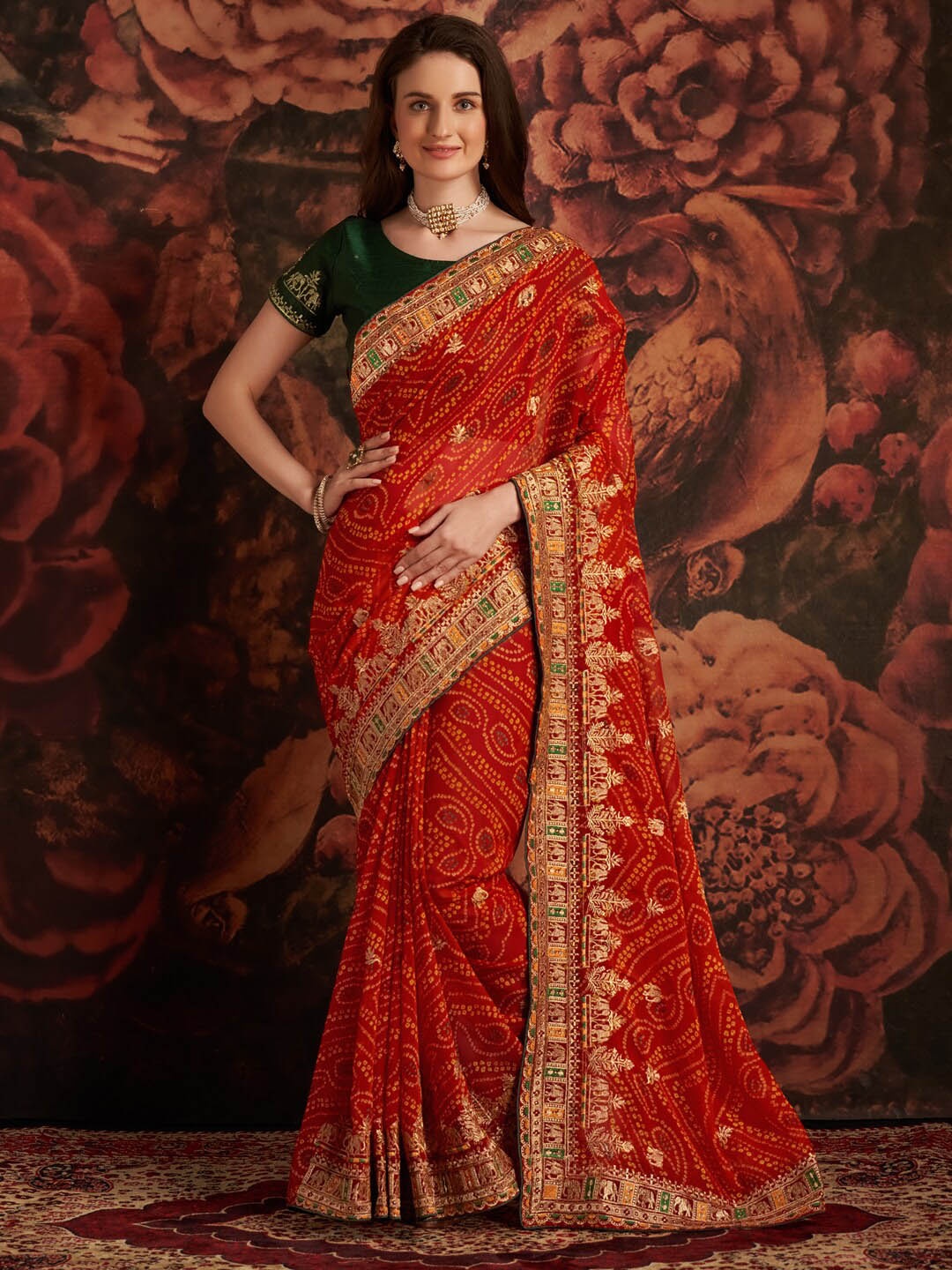 

Anouk Red & Green Printed & Embroidered Pure Georgette Bandhani Saree