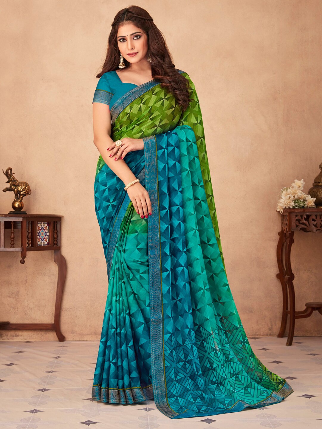

Anouk Blue & Green Geometric Printed Zari Pure Chiffon Bagru Saree