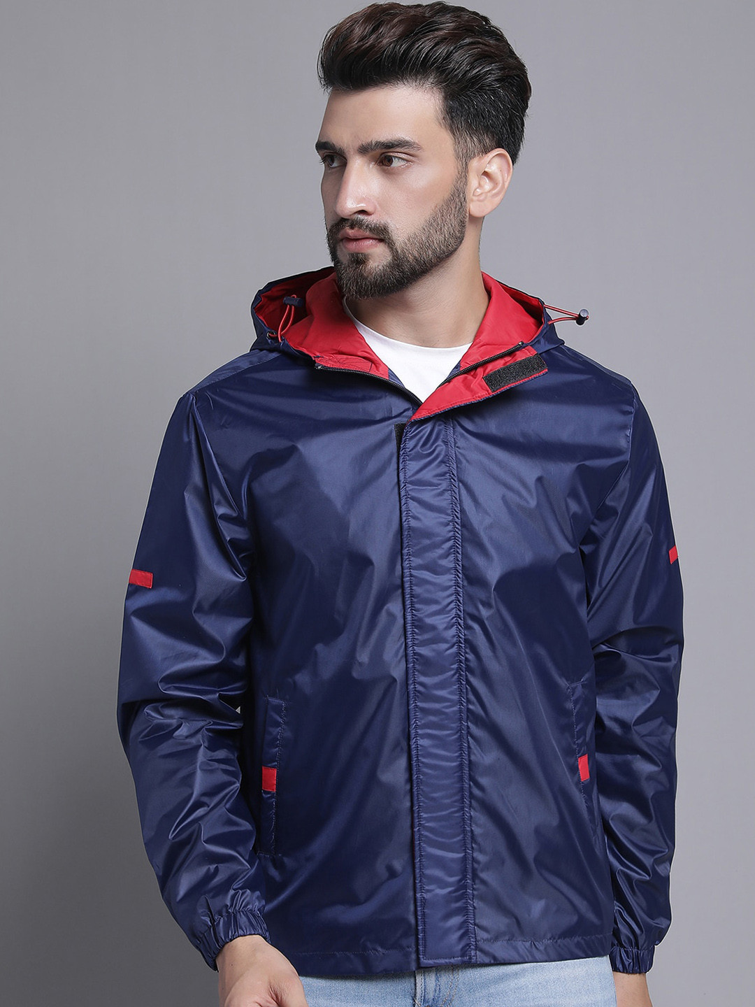 

HOUSE OF VEDAS Men Navy Blue Colourblocked Windcheater and Water Resistant Outdoor Sporty Jacket with