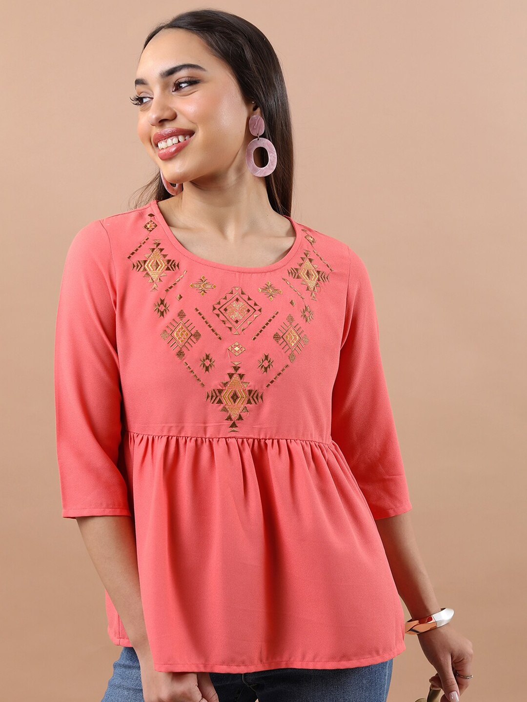 

Vishudh Ethnic Motifs Embroidered A-Line Top, Coral