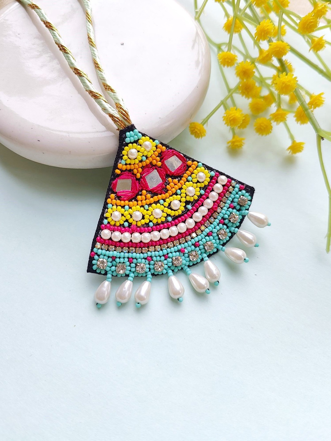 

Crunchy Fashion Women Beaded Thread Lumba Rakhi, Pink