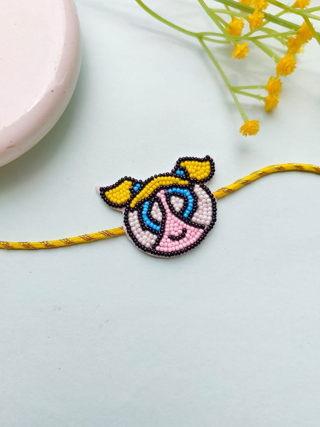 

Crunchy Fashion Kids Beaded Thread Rakhi, Yellow