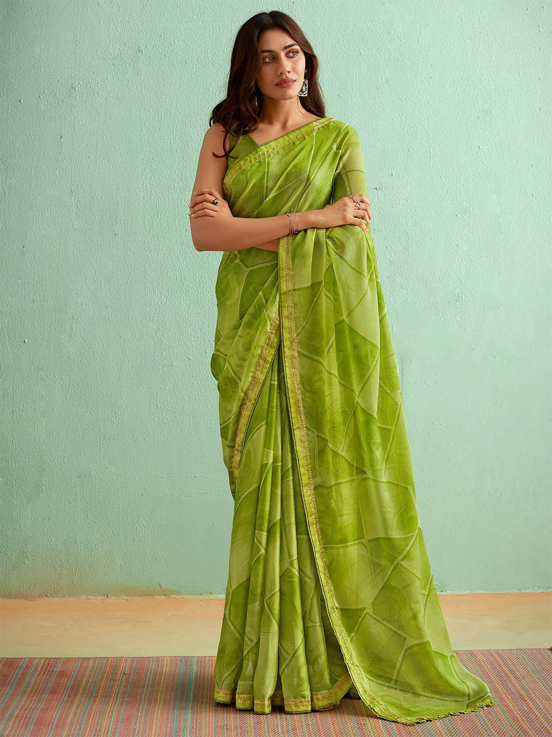 

Saree mall Abstract Printed Pure Georgette Sarees, Green