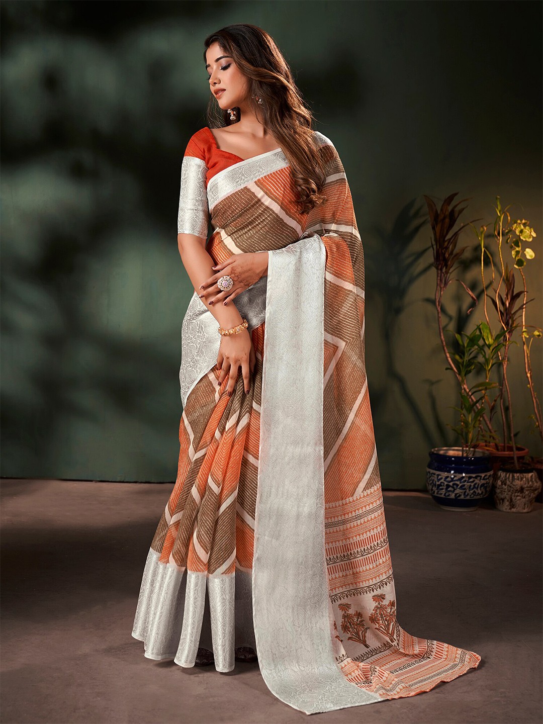 

Saree mall Ethnic Motifs Printed Zari Sungudi Sarees, Brown
