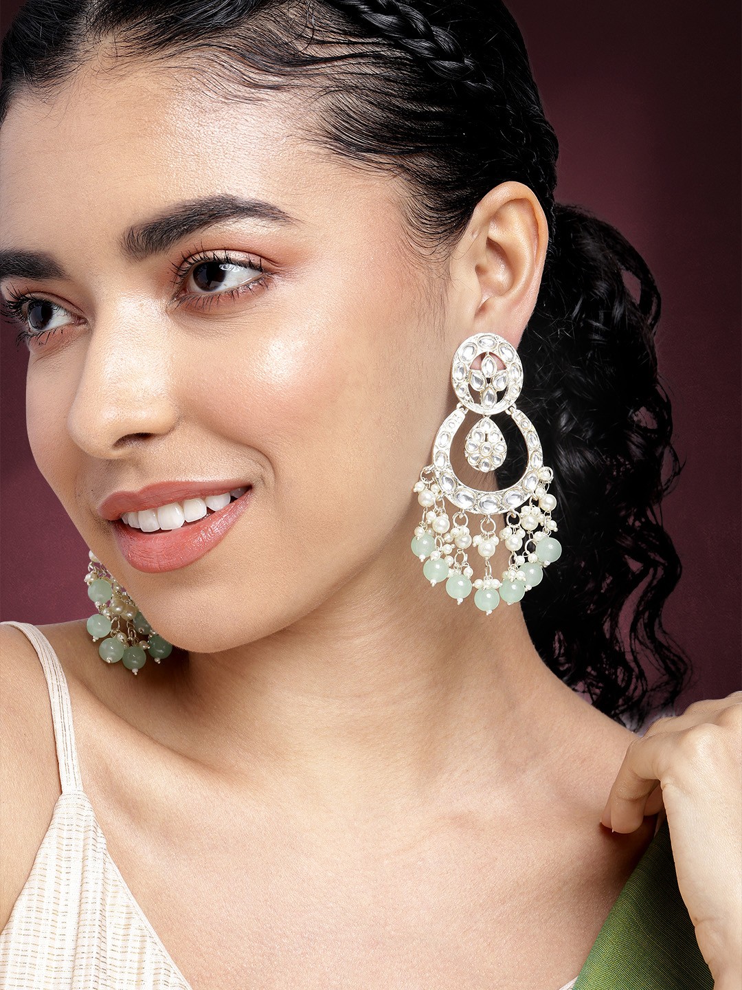 

Peora Gold-Plated Kundan Studded Crescent Shaped Chandbalis Earrings, Green