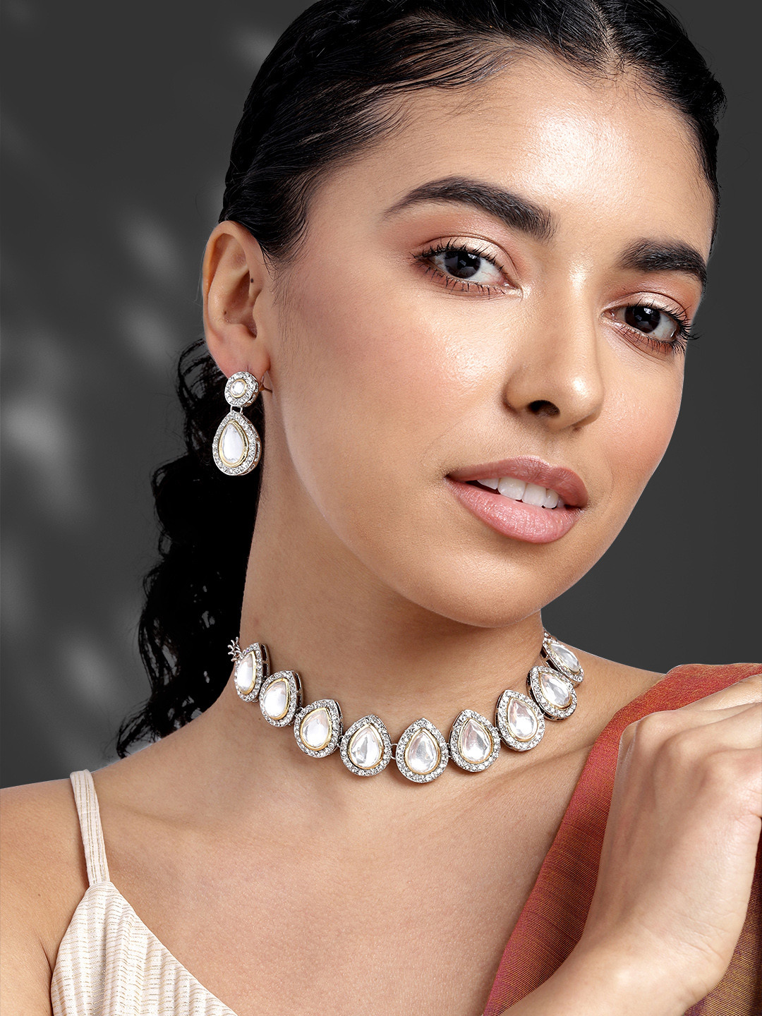 

Peora Women Gold-Plated Kundan Studded Necklace with Earrings, White