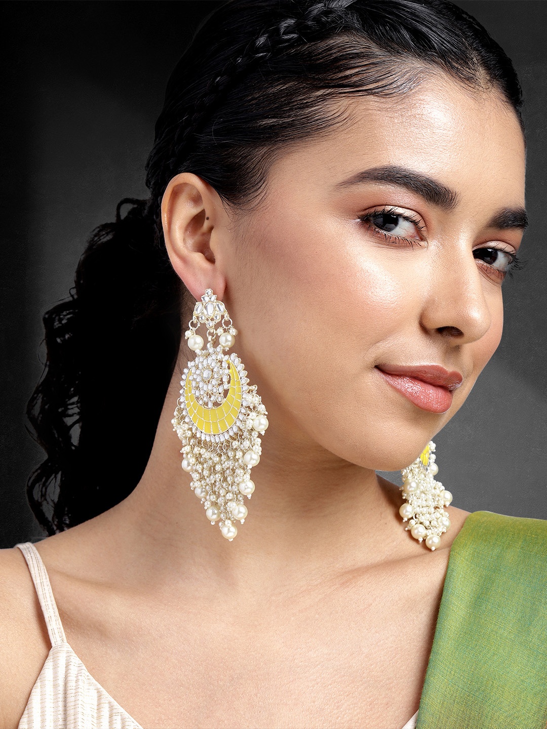 

Peora Gold-Plated Kundan Studded Crescent Shaped Chandbalis Earrings, Yellow