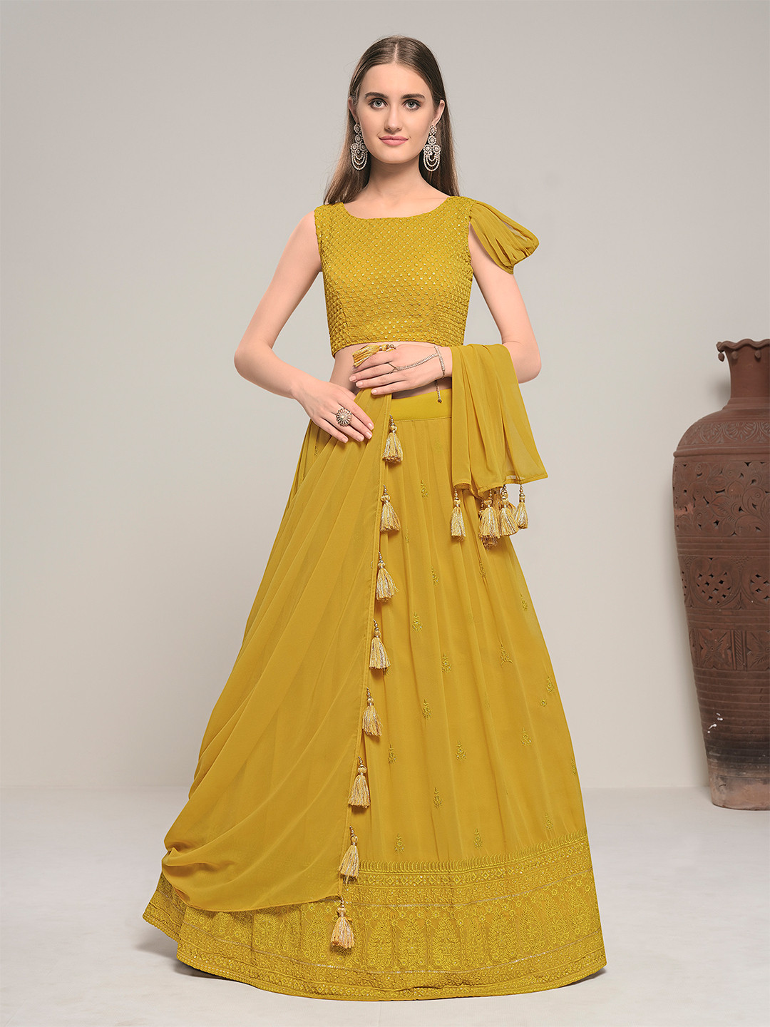 

Fusionic Mustard Embroidered Semi-Stitched Lehenga & Unstitched Blouse With Dupatta