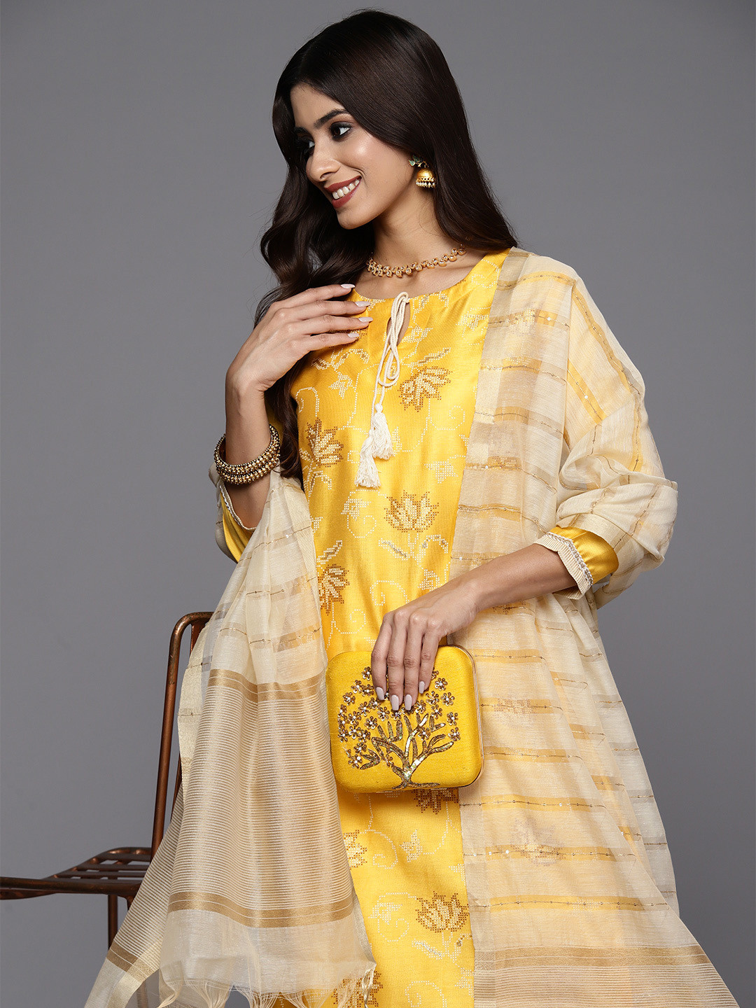 

Indo Era Women Printed Regular Chanderi Silk Kurta with Sharara & With Dupatta, Yellow