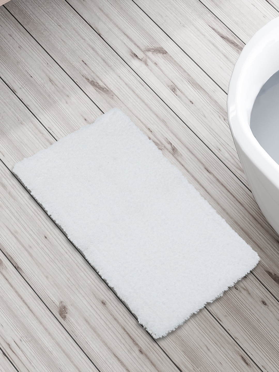 

Home Centre White Anti-Slip Plush Bath Mat