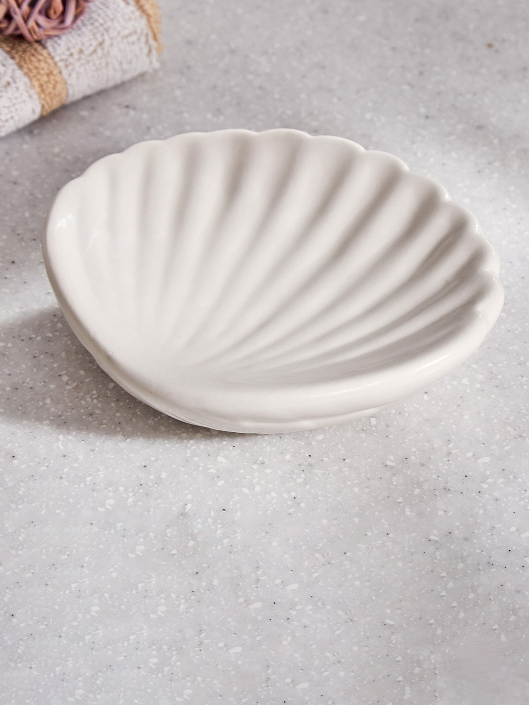 

Home Centre White Textured Ceramic Soap Dish
