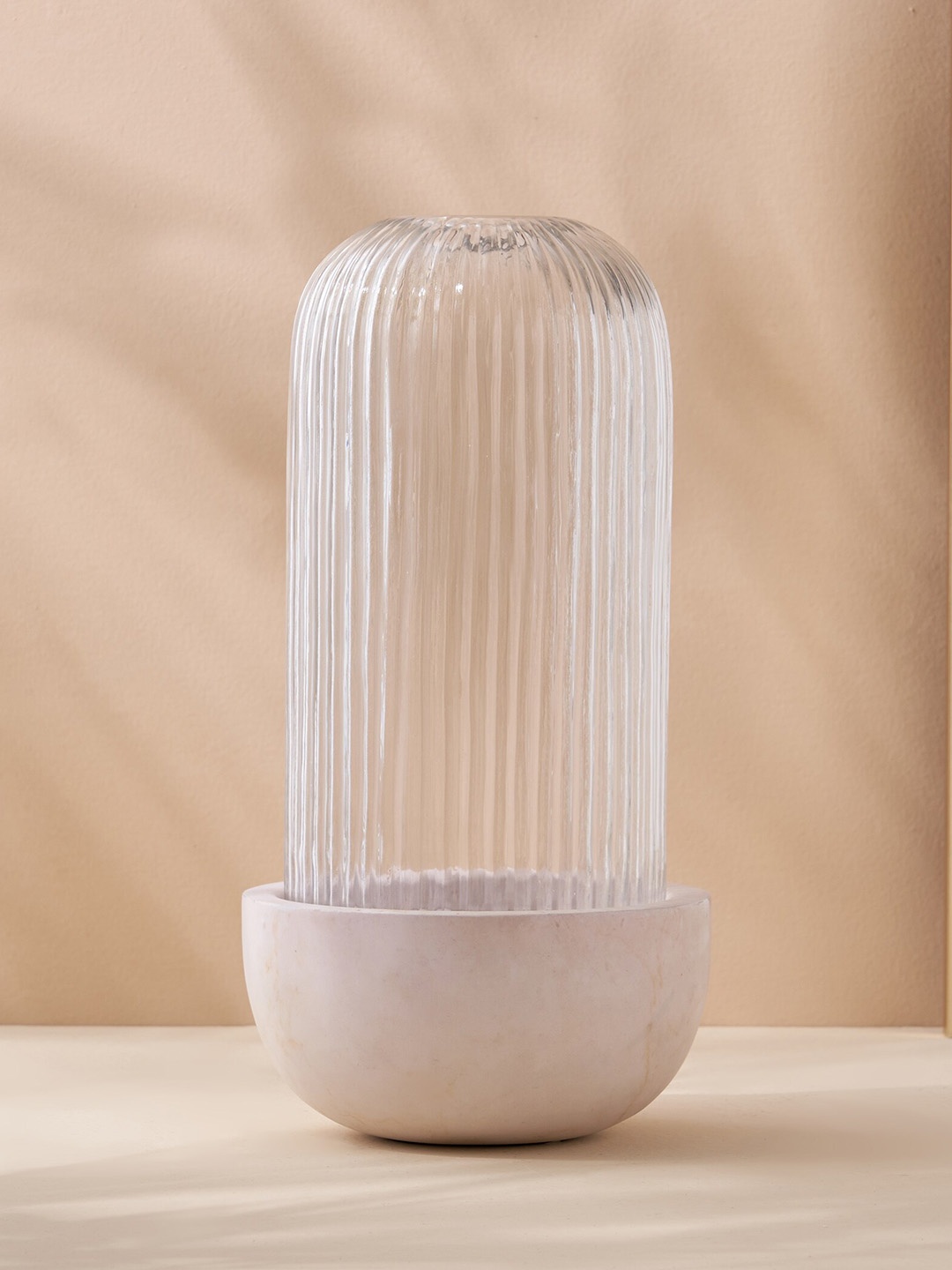 

Home Centre Transparent Candle Holder