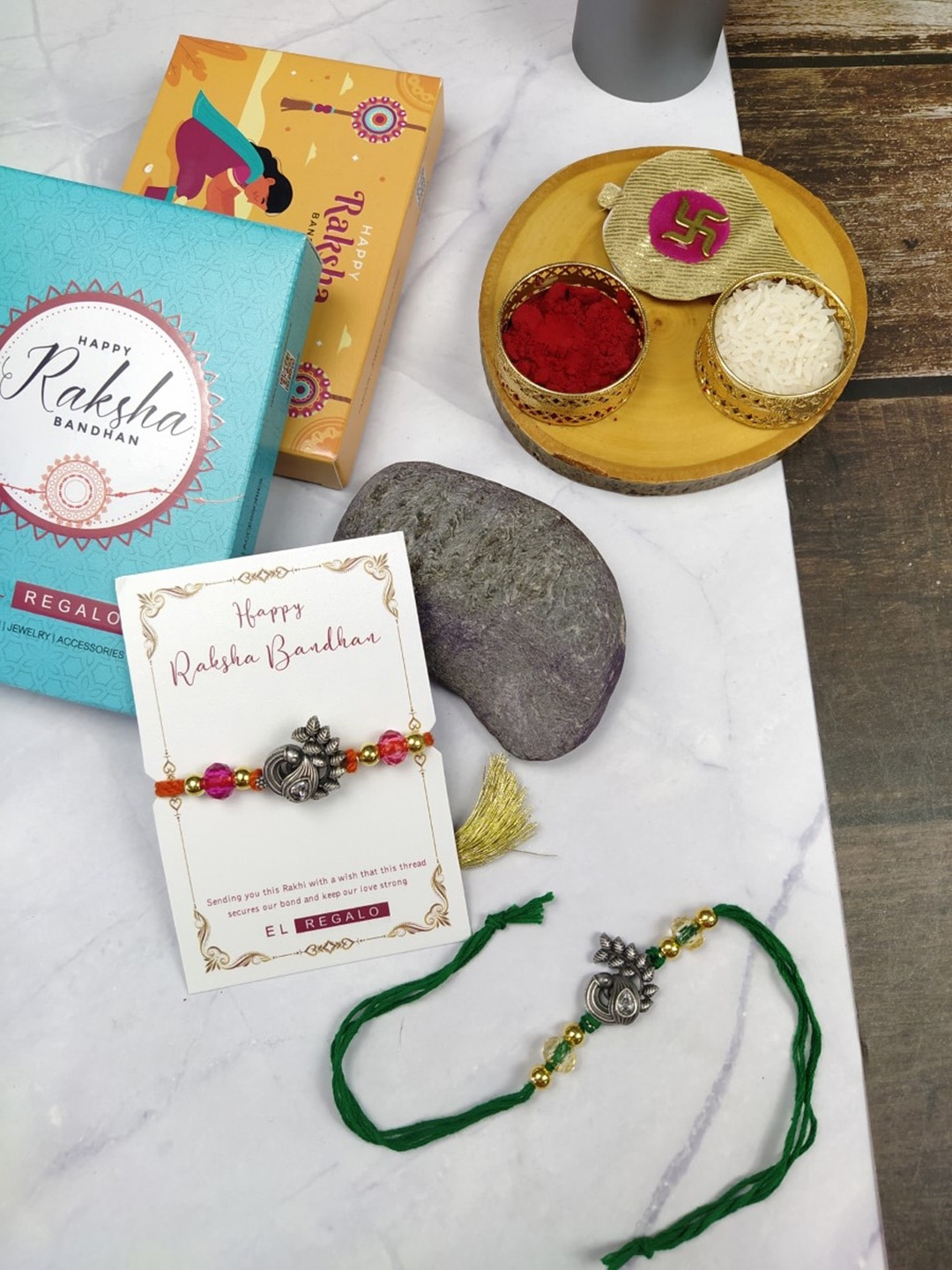 

EL REGALO Bhaiya Bhabhi Set Of 2 Stone-studded Peacock Rakhi With Roli Chawal, Red