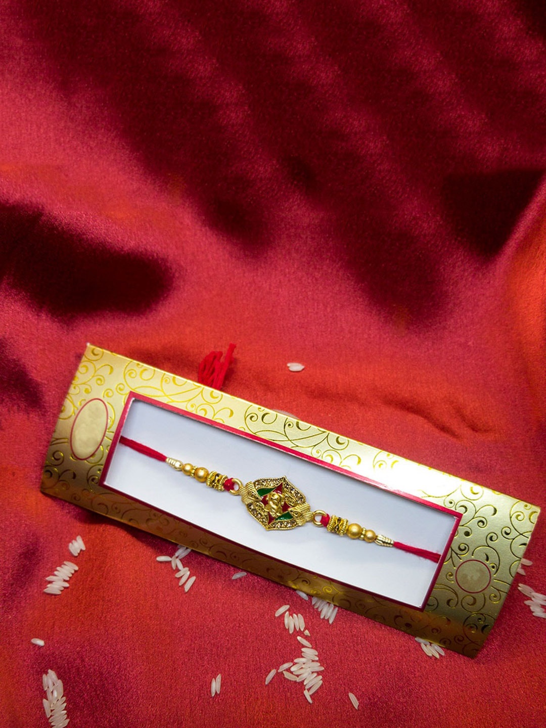 

CRAYTON Stone-studded & Beaded Ethnic Ganesh Charm Rakhi, Gold