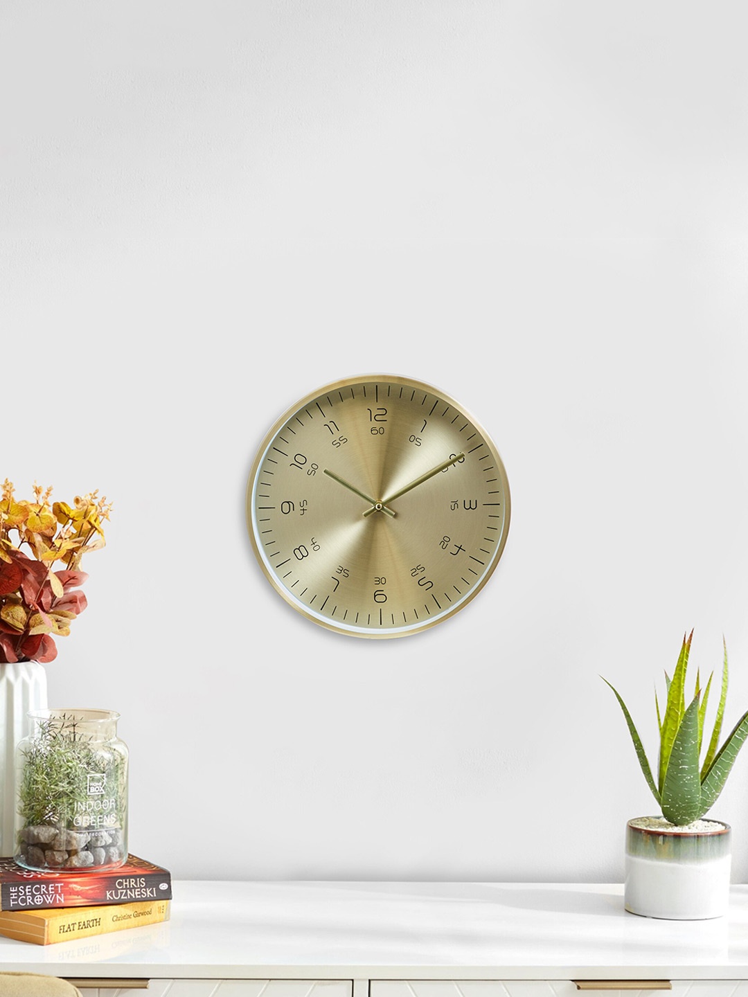 

Home Centre Gold-Toned & Black Contemporary Wall Clock